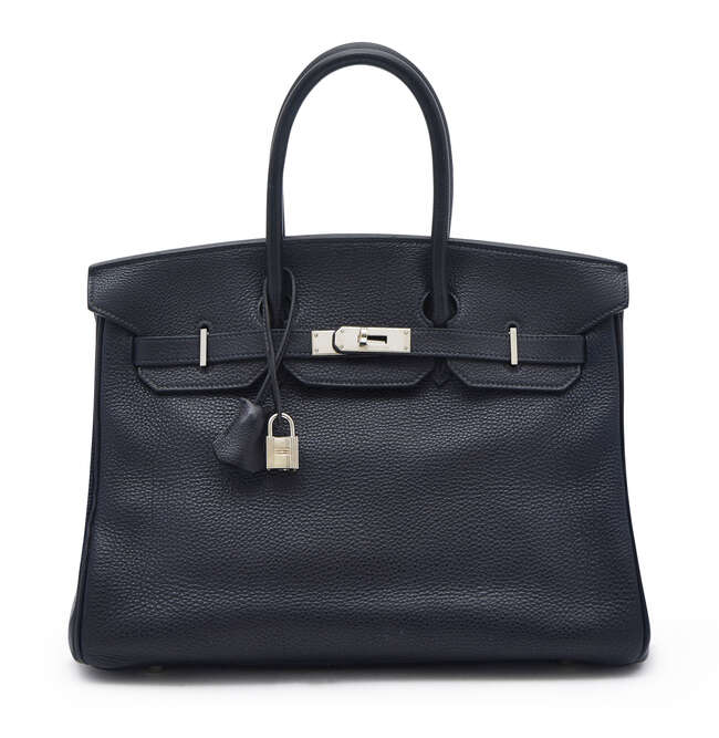 
	
		Hermes: a Birkin Retourne handbag, in navy blue Togo leather, blind stamp D for 2000,...
