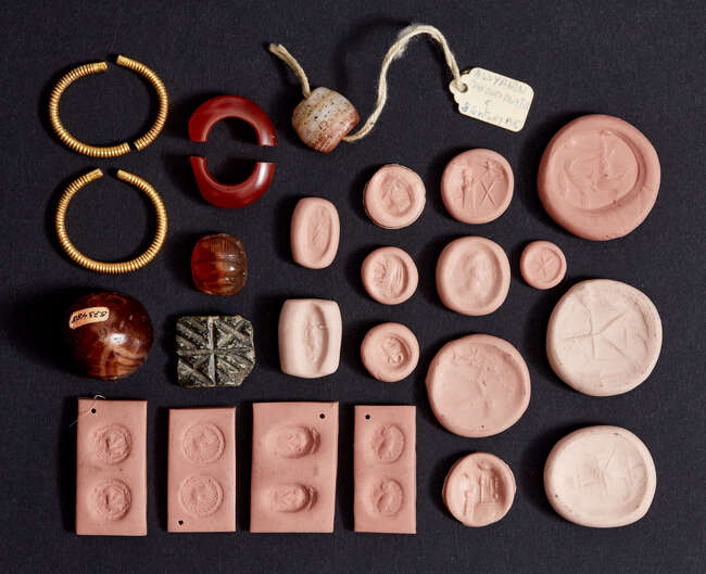 
	
		A group of Near Eastern jewellery and stamp seals
		2nd Millennium B.C.  7th Century...