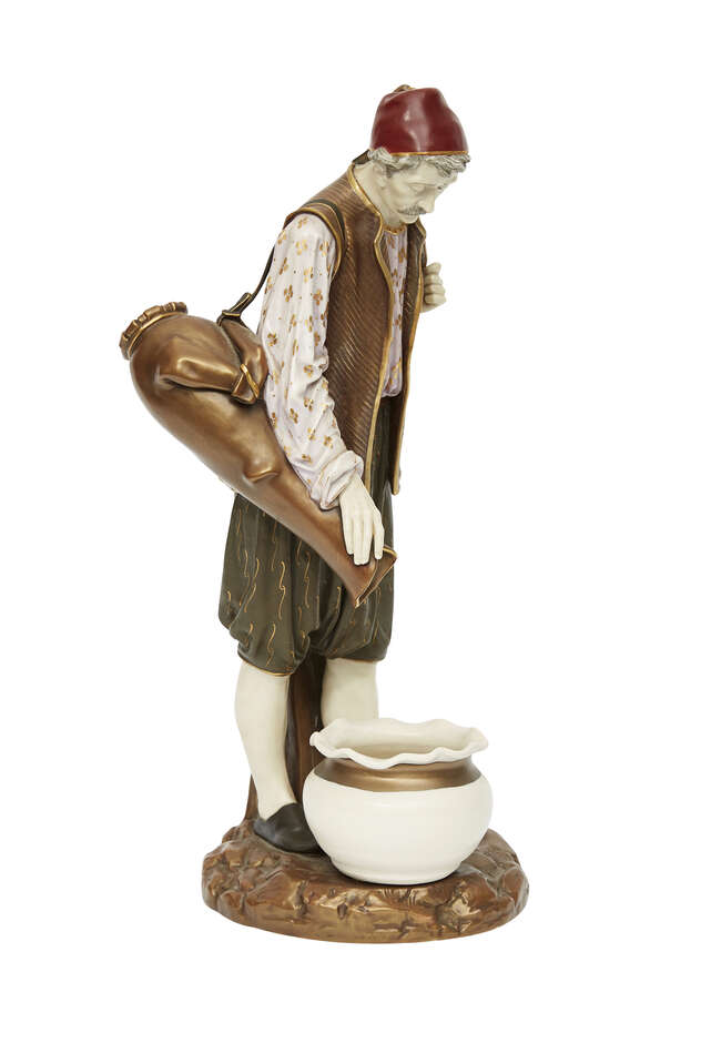
	
		A Royal Worcester porcelain figure of a Turkish water carrier after a model by James...
