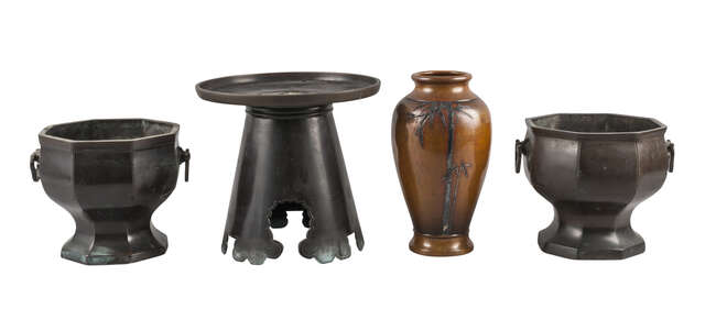 
	
		A Japanese bronze usubata ikebana vase, early 20th century, a pair of bronze hexagonal...