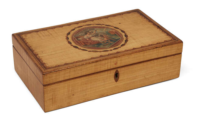 
	
		A pale satinwood painted and inlaid rectangular box, 19th century, with divided writing...