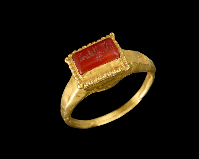 ISLAMIC WORKS OF ART
A gold ring with inscribed carnelian seal,12th century and later,
The band...