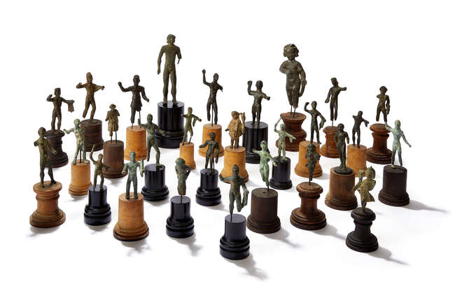 
	
		The Hohenzollern Collection of Ancient Bronze Statuettes, 
		 
		A large group of 27...