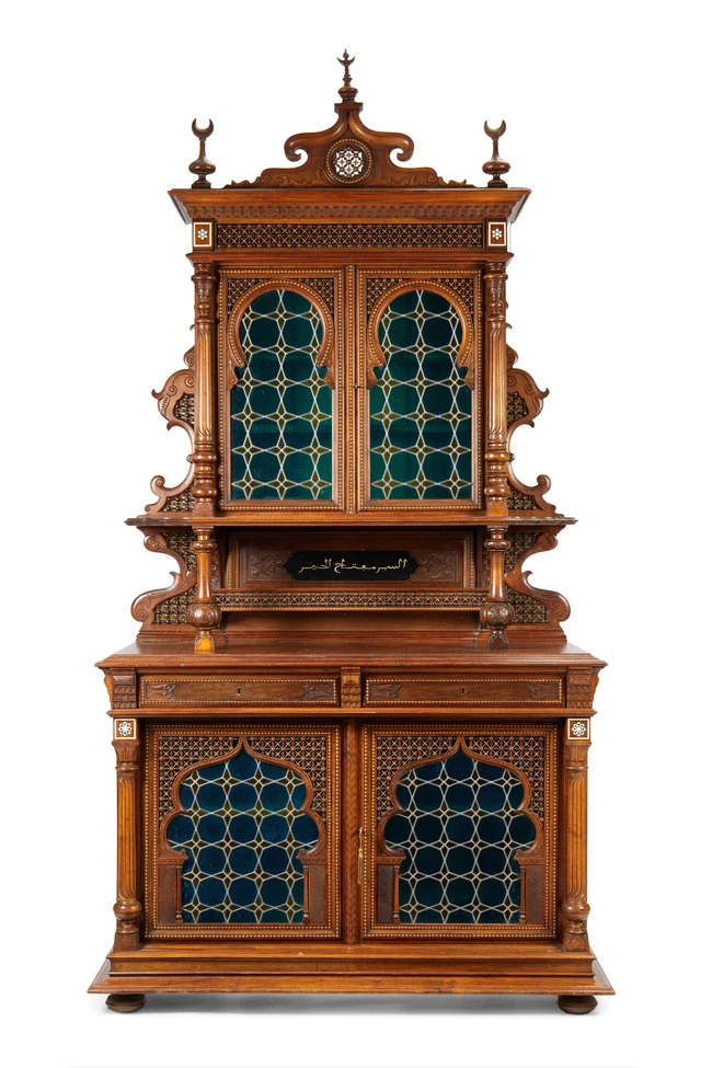 A stained glass and wood cupboard, Possibly workshop of Giuseppe Parvis, Cairo, Egypt, retailed...