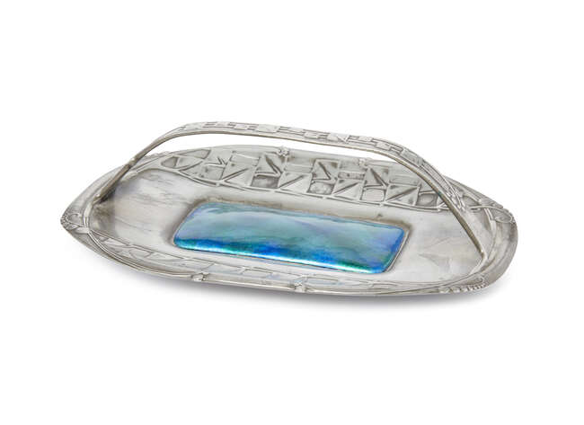 
	
		Archibald Knox (1864-1933), a Liberty & Co &#39;Tudric&#39; polished pewter and enamel cake...