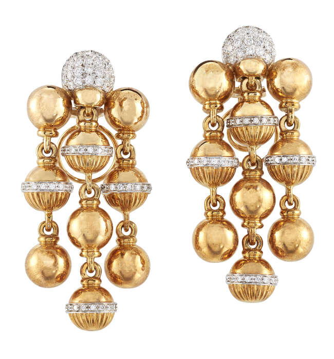 
	
		A pair of diamond ball drop chandelier earrings, the rounded pave diamond tops to three...
