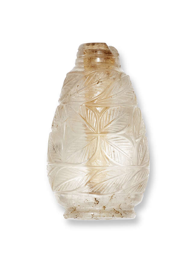 
	
		A carved rock crystal perfume bottle, India, early 20th century, with leaf design to...