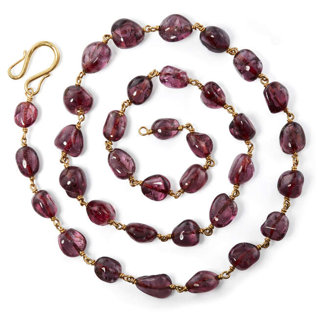 
	
		A spinel necklace, India, with thirty-seven polished spinels, each weighing between 12-15...