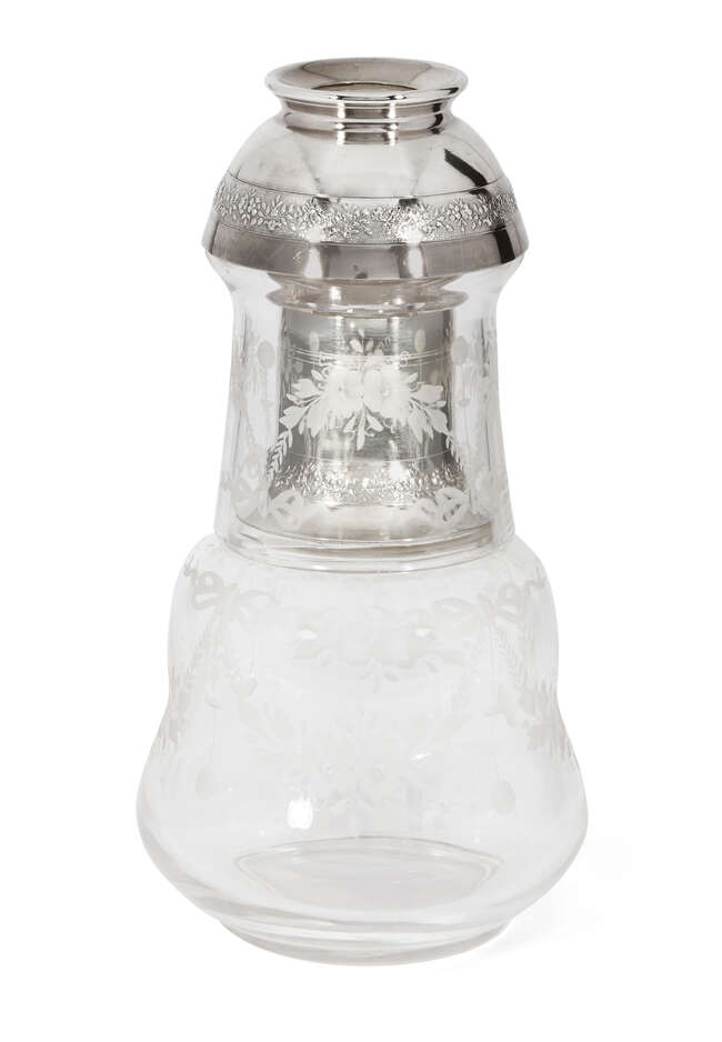 
	
		A French silver mounted bedside water carafe, maker&#39;s mark rubbed, the carafe and glass...