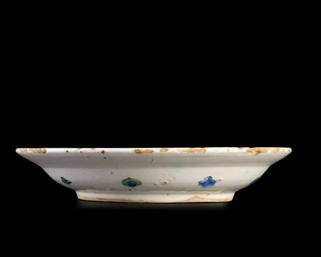 An Iznik pottery dish, Ottoman Turkey, first half 17th century, 
Of typical form on short...