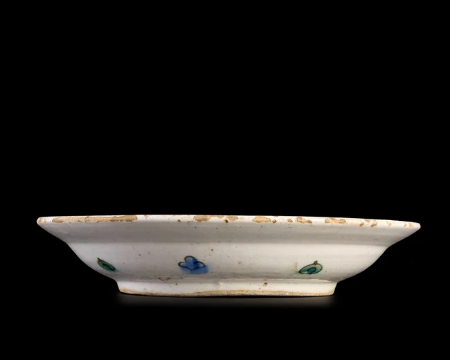 An Iznik pottery dish, Ottoman Turkey, first half 17th century, 
Of typical form on short...