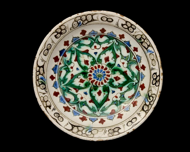 An Iznik pottery dish, Ottoman Turkey, first half 17th century, 
Of typical form on short...