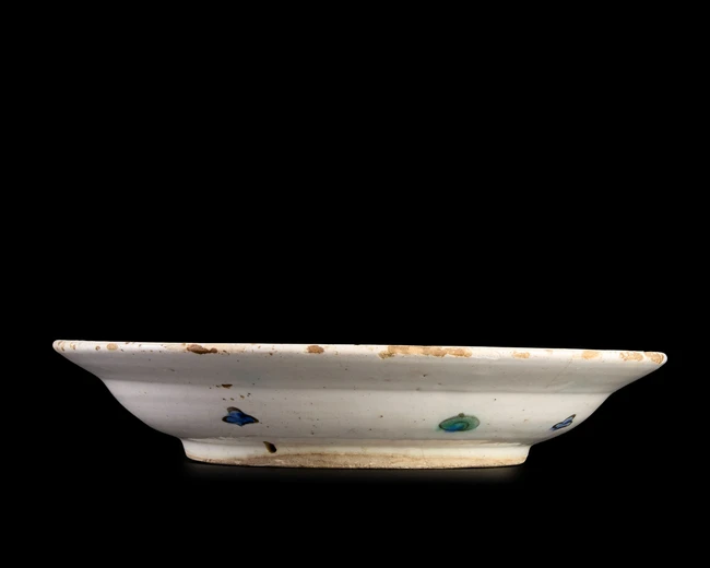 An Iznik pottery dish, Ottoman Turkey, first half 17th century, 
Of typical form on short...
