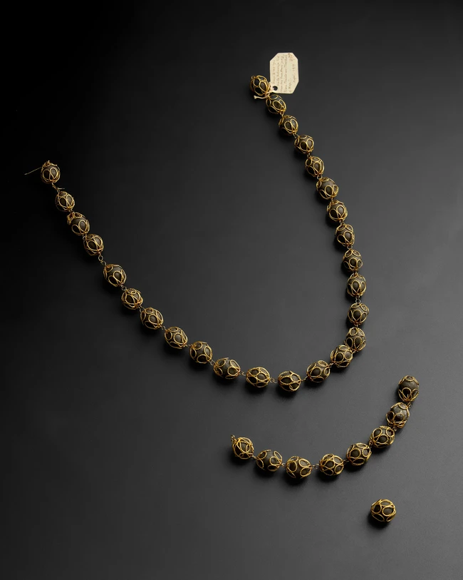 A gold mounted thirty five bezoar stones necklace, North India, 19th century, 
Each stone in...