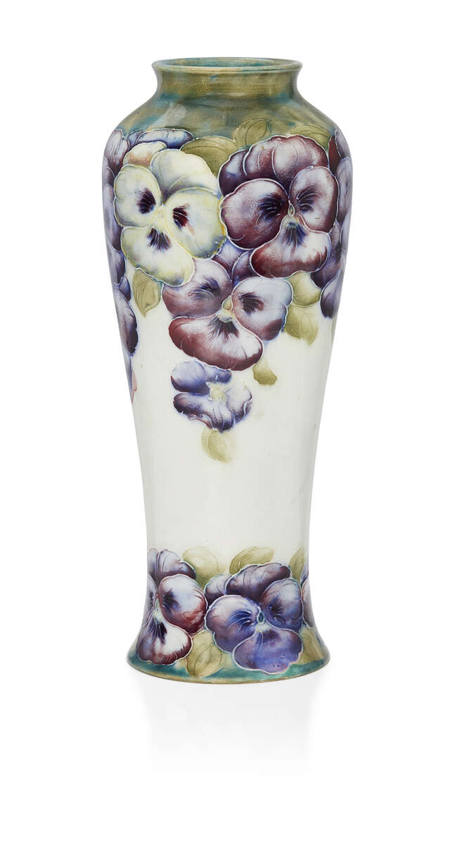 
	
		William Moorcroft (1872-1945), a Pansy pattern vase 
		1911-1913, signed in green W...