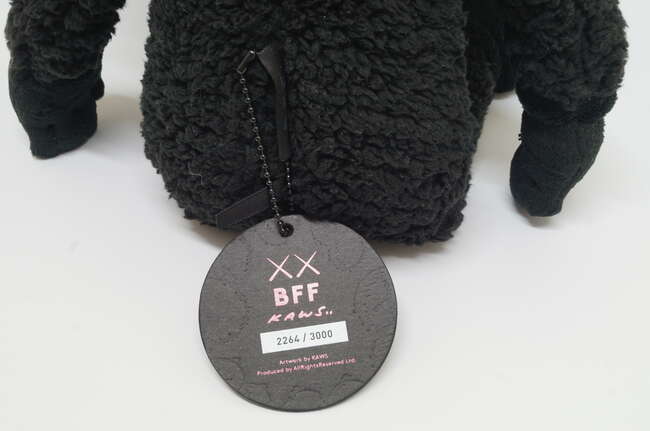 
	
		Kaws,
		American b. 1974-
		 
		BFF Companion (Black), 2016;
		 
		plush fabric...