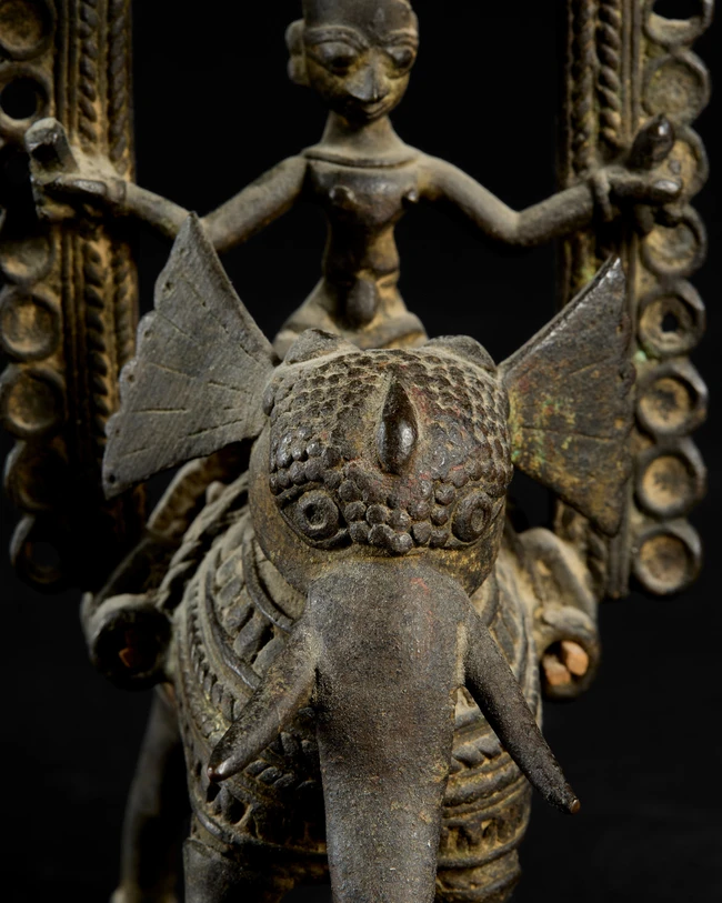A bronze figure of Indra on Airavata, Bastar, Eastern India, 19th century, 
Under a domed...