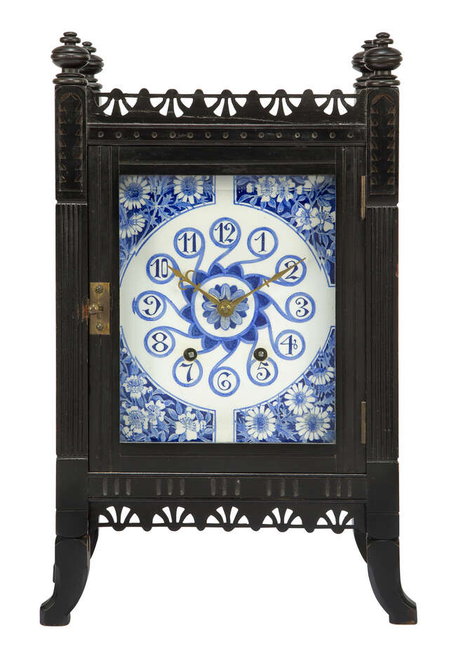 
	
		Lewis F. Day (British 1845-1910) in the manner of, an ebonised clock by J. W. Benson,...