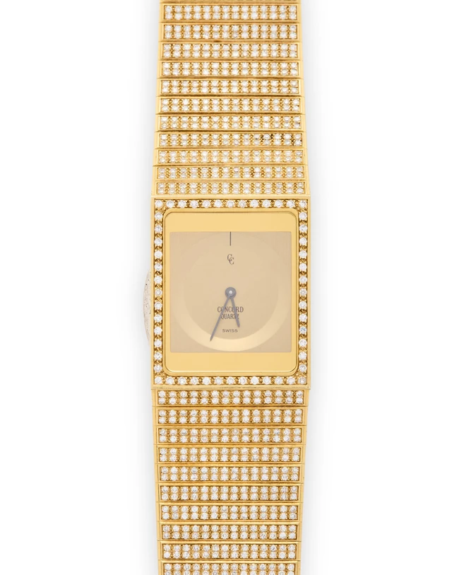 Concord. An 18ct gold and diamond set quartz bracelet watch Delirium, Reference 51 76 615,...
