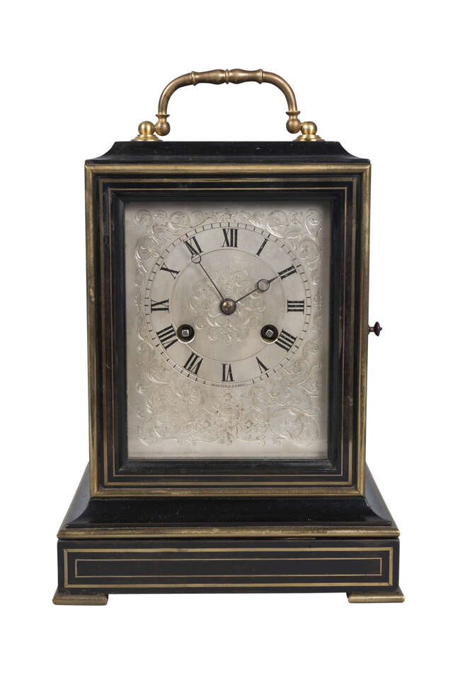 
	
		A French ebonised and brass mounted mantel clock, 19th century,  the rectangular case...
