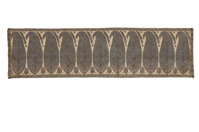 
	
		An embroidered Kashmiri shawl border, late 18th century, with large repeating mosaic...