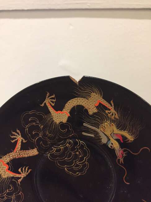 
	
		A Chinese painted lacquer coffee set, 20th century, comprised of eight cups and saucers...