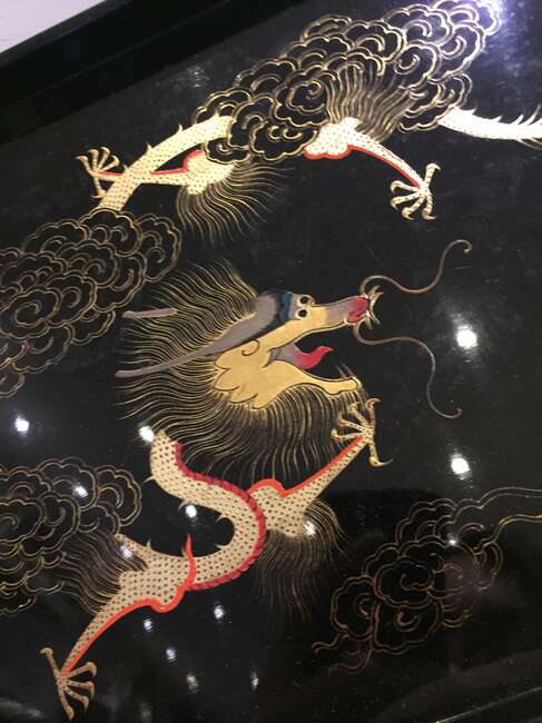 
	
		A Chinese painted lacquer coffee set, 20th century, comprised of eight cups and saucers...