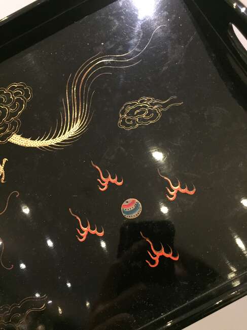 
	
		A Chinese painted lacquer coffee set, 20th century, comprised of eight cups and saucers...