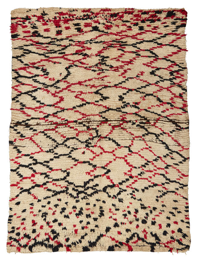 
	
		Moroccan, a handwoven long pile wool rug
		Second quarter 20th century
		Woven with...