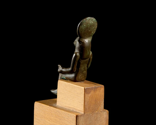 A small Egyptian bronze figure of a seated lion-headed Sekhmet,Late Period, circa 664-525...