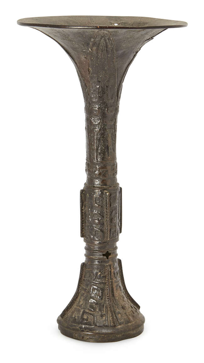 
	
		A Chinese archaistic bronze beaker vase, gu, Yuan/Ming Dynasty, the slender vessel cast...