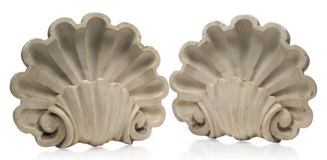 
	
		A pair of shell form plaster wall lights,
		Second half 20th Century,
		Incorporating...