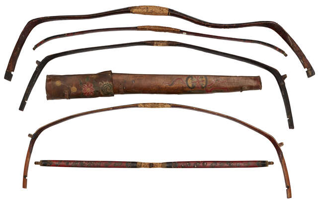 
	
		Four Chinese bows, early 19th century, three with cow horn mounts, one decorated with...