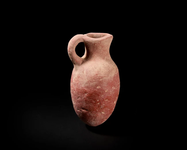 PART I ANTIQUITIES, ISLAMIC AND INDIAN ARTS LOTS 1-256
ANTIQUITIES
An unglazed terracotta Iron...