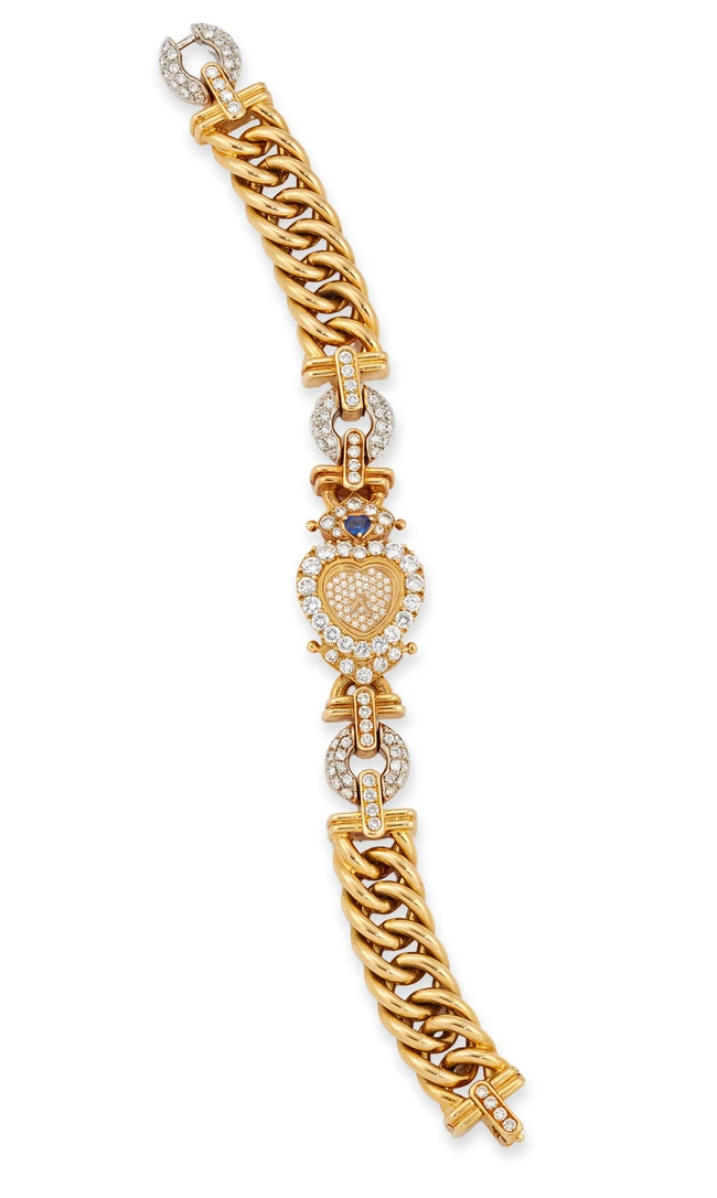 Swiss. An 18ct white and yellow gold sapphire and diamond set bracelet watch Case back numbered...