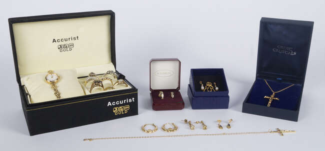 
	
		A ladies Accurist 9ct gold cased quartz wrist watch, circular white enamel dial with gold...