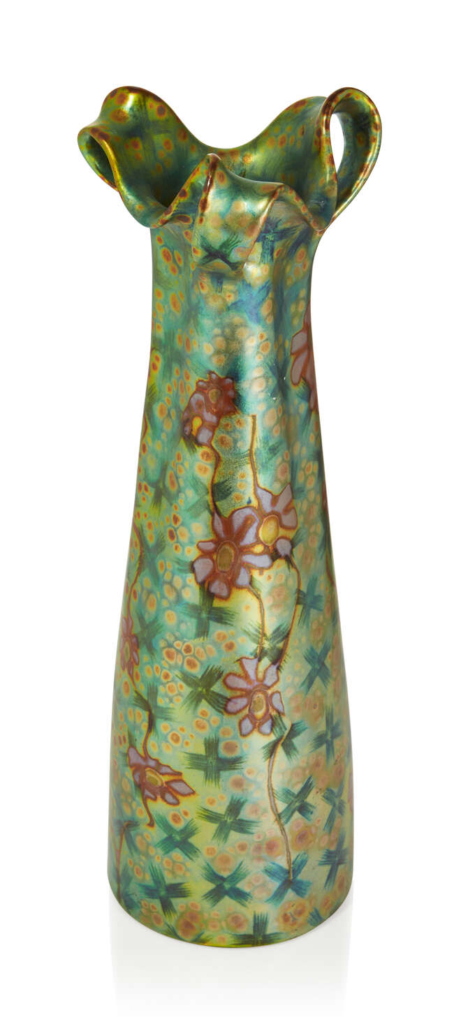 
	
		 Zsolnay (Hungarian), an Art Nouveau Eosin glazed three handled vase, the form designed...