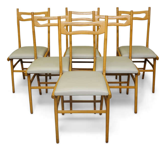 RTO Manner of Ico ParisiDining table and six dining chairs, circa 1950Beech, glass, leatherTable...