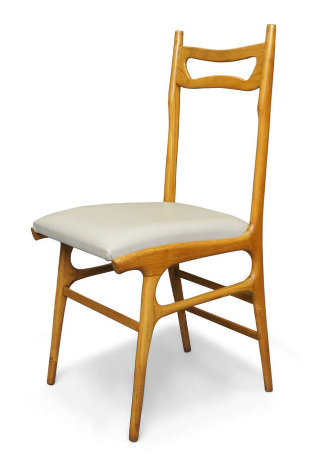 RTO Manner of Ico ParisiDining table and six dining chairs, circa 1950Beech, glass, leatherTable...