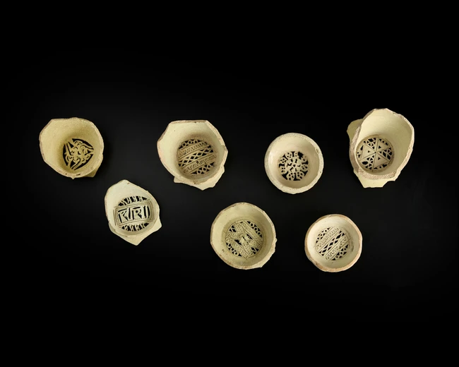 Seven fragmentary unglazed pottery water filters, Fatimid or Mamluk Egypt, 10th-14th...
