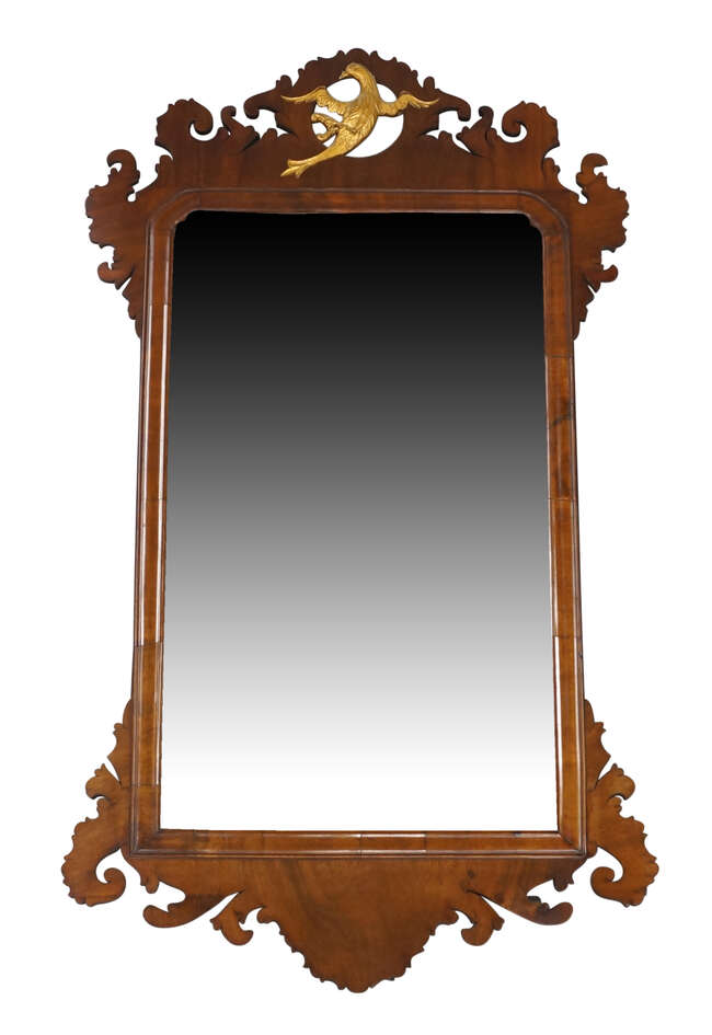 
	
		A George III mahogany fretwork mirror, late 18th century, the scrolling frame with...