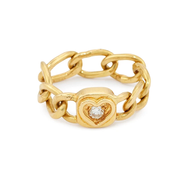 Alan Gard. An 18ct gold diamond set chain ring, with a brilliant-cut diamond set heart-shaped...