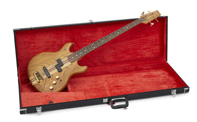 
	
		A Vantage VP820B base guitar, no. 2120823, with maple and grain effect finish body and...