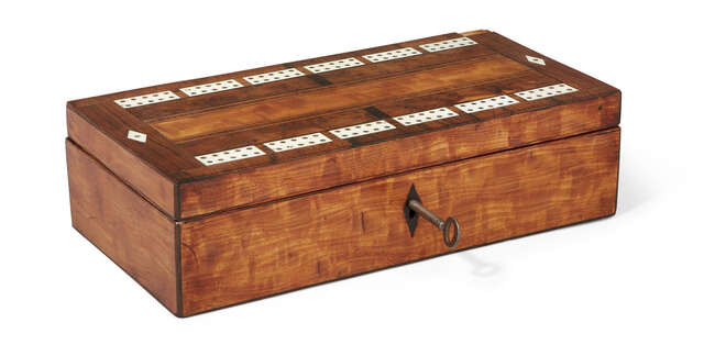 
	
		A satinwood games box, 19th century, ivory inlaid with bridge markers to lid, opens to...