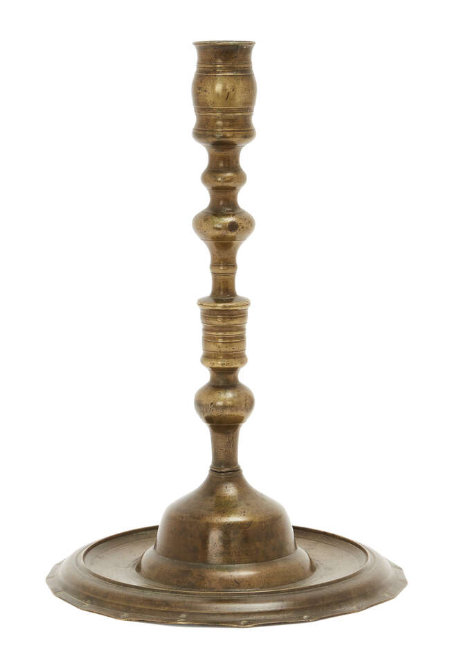
	
		An Ottoman spun brass candlestick, Turkey, 17th century, 
		made in two sections, on...