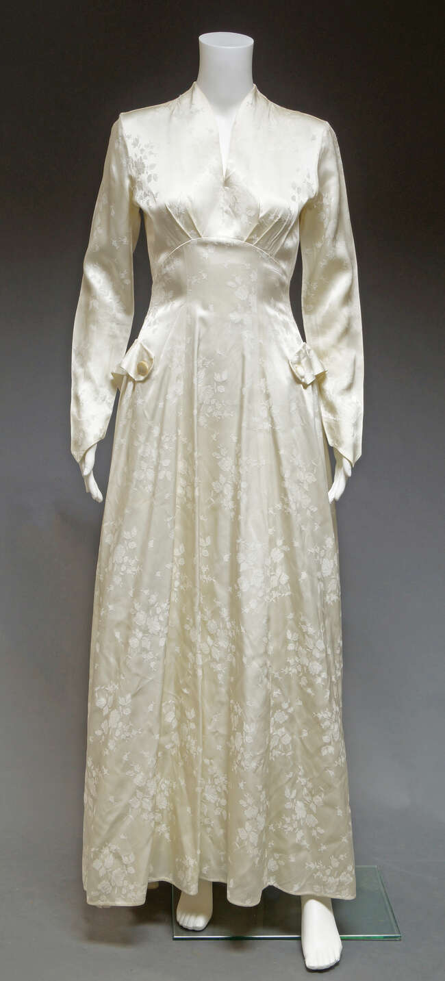 
	
		A 1940s damask wedding gown, by Emerson for Bourne & Hollingsworth, together with three...