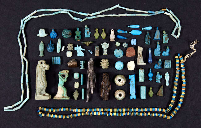 
	
		A miscellaneous group of Egyptian faience amulets, pendants and beads, New Kingdom  Late...