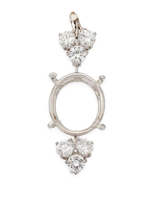 A diamond set component, composed of a vacant central oval collet, with a trefoil of...