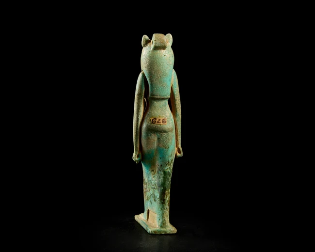 A large Egyptian blue-green faience amulet of the lioness-headed goddess Sekhmet, Third...