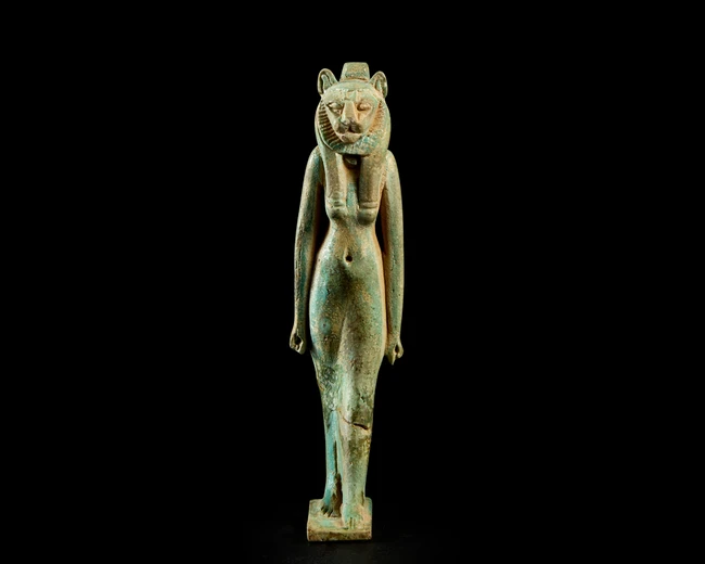 A large Egyptian blue-green faience amulet of the lioness-headed goddess Sekhmet, Third...